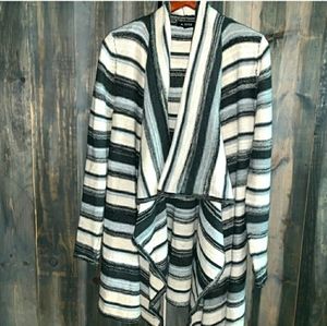 A. Byer neutral colored long waterfall car…